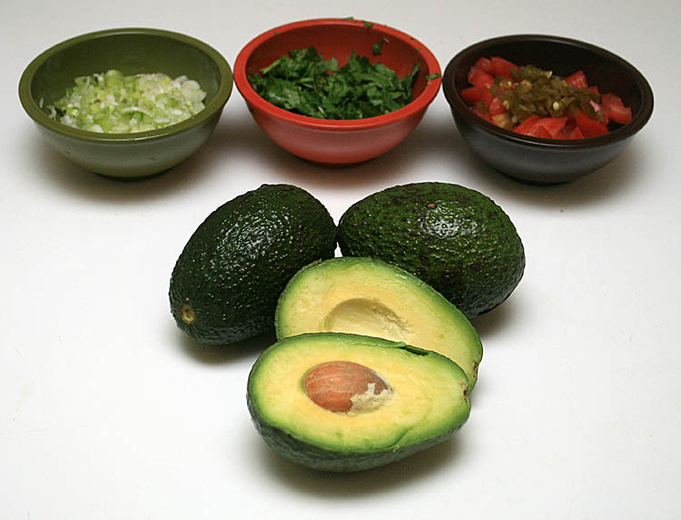 7. Cut avocados in half, remove the pit and peel with your fingers. Ripe ones should go very easily. 