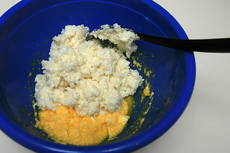 12. Add the cooked rice into the bowl with yolks.