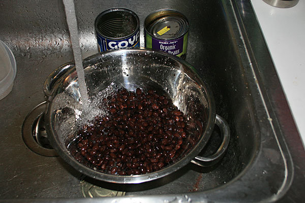 3. Open the second can of black beans, rinse properly and drain.