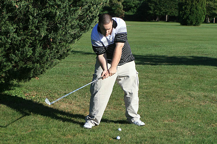 Sometimes golf looks more like hockey. :-) Sometimes golf looks more like hockey. :-)