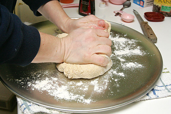 Kneeding the dough Kneeding the dough